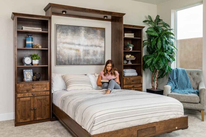 woman lying on a comfortable murphy bed